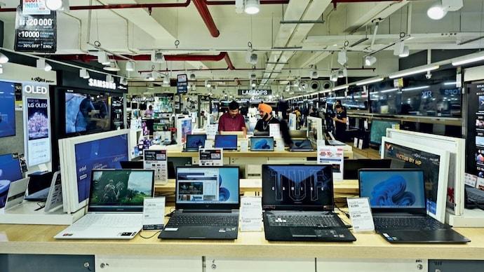 market matters laptops on display at a reliance digital store in delhis janakpuri photograph by r  x